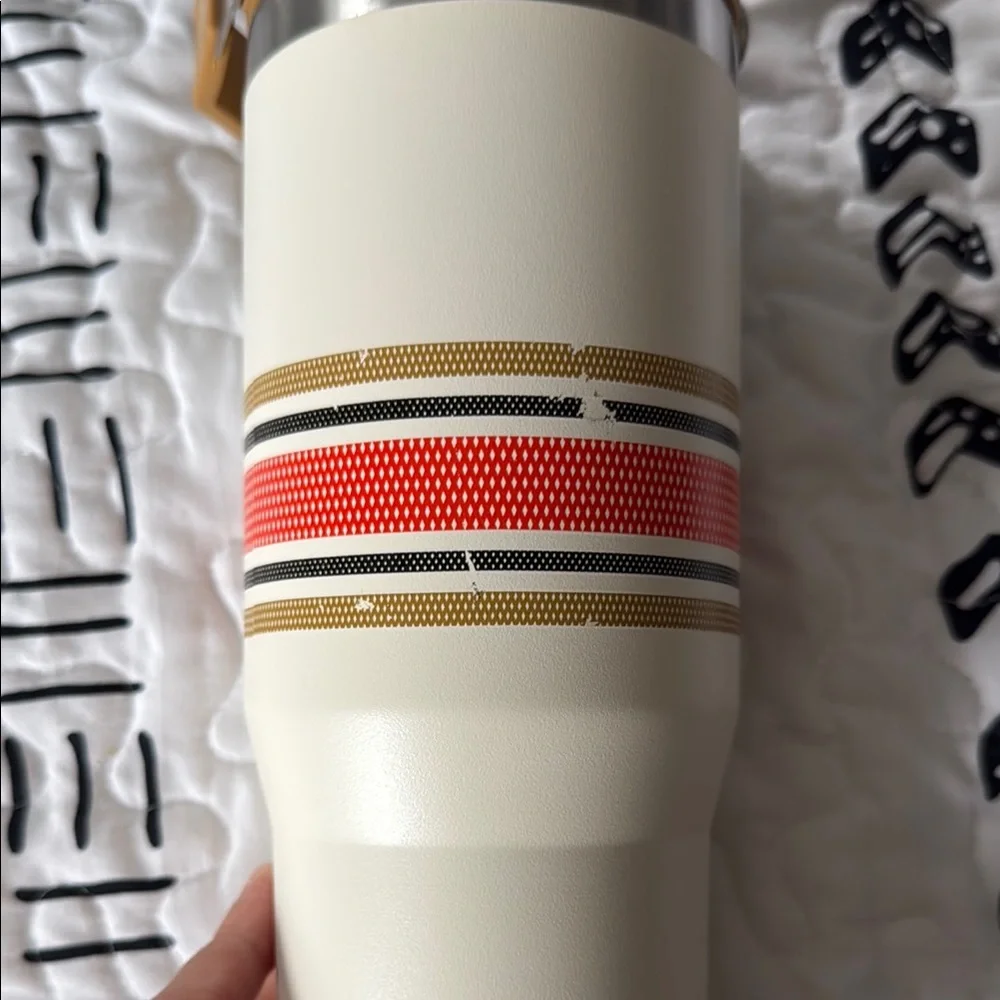 Stanley Cream Travel Tumbler with Mustard Handle and Red Accent Stripes